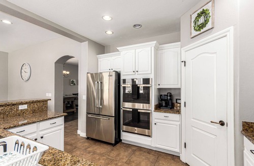 Mesa House | Spacious 5-bedroom house in E Mesa {pool+spa+putting green+foosball-sleeps 14}