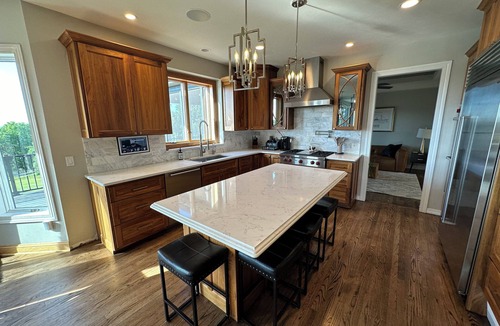 Dane County House | Spacious 5-bedroom house sleeps 14 with pool, hot tub, sauna and more!
