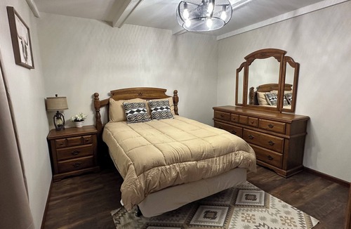 Moberly Other | Spacious 5-bedroom log cabin home with 2 ponds and 50 acres just outside Moberly