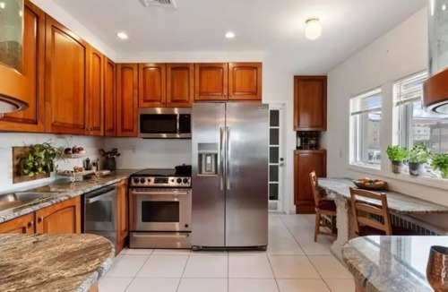 Long Beach House | Spacious 5-bedroom ocean view house in serene Long Beach with fitness room.