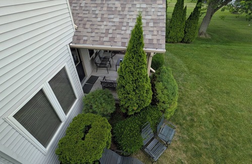 Pearl Beach House | Spacious 5 Bedroom - right on the St. Clair River with private dock and frontage