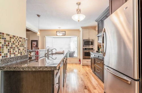 Windermere House | SPACIOUS 5 Br + 5 Br | Private HEATED Pool & Hot Tub | 1-minute WALK to Beach