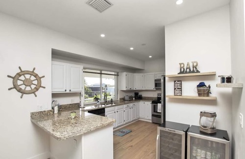 Venetian Shores House | Spacious 5BR San Remo Canalfront iwith hot tub in Islamorada, perfect for 10 guests.