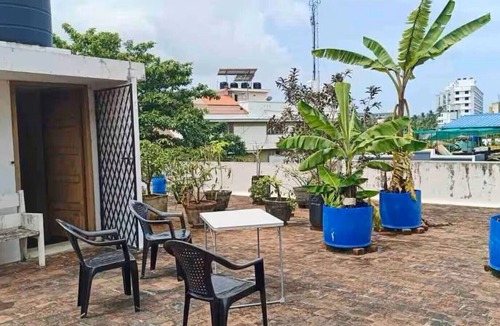 University of Kerala Senate House Campus Apartment | Spacious AC Bedroom with Attached Bathroom, in the Heart of Trivandrum