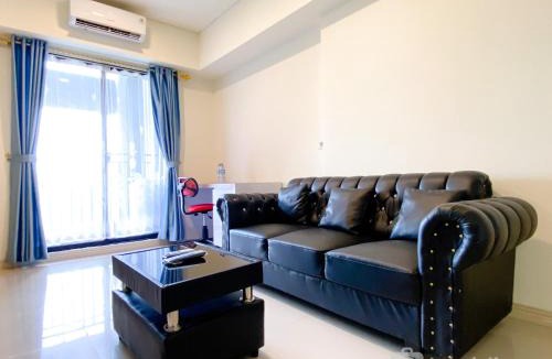 Cikarang Apartment | Spacious and Comfy 2BR with Extra Room at Meikarta Apartment By Travelio