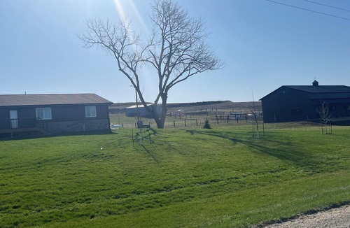 Harrison County House | Spacious and cozy 4-bedroom house in rural Iowa with inground backyard pool.
