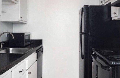 The Galleria Apartment | Spacious and Modern Hotel Suites with Heated Pool, Gym and Hot Tub!