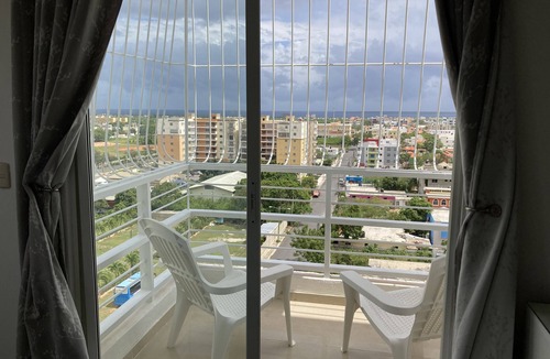 La Romana Apartment | Spacious and relaxing with an amazing town skyline and far island & ocean view.