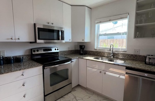 Naples Park Apartment | Spacious apartment on two floors with beautiful sunset views.
