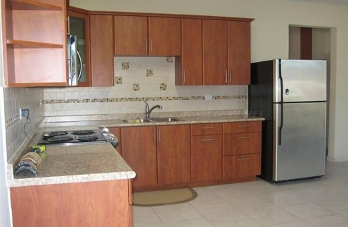 Arenales Bajos Apartment | Spacious, attractively decorated 2 BR 1bath gated Apt, 4 Mins to Jobos Beach