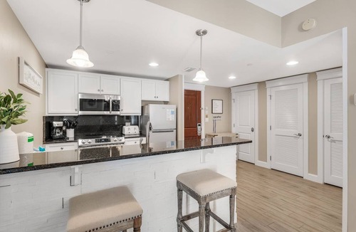 Baytowne Wharf Condo | Spacious Balcony ~ Pool ~ Outdoor Seating
