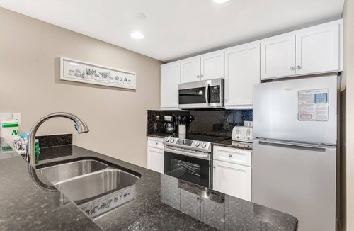 Baytowne Wharf Condo | Spacious Balcony ~ Pool ~ Outdoor Seating