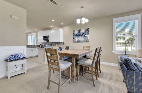 Red Fish Cove House | Spacious beach condo with ocean view, balcony, shared pool & close to the beach