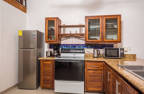 Playa Langosta Apartment | Spacious beautiful Apartment, with pool in Tamarindo, only steps from the beach.