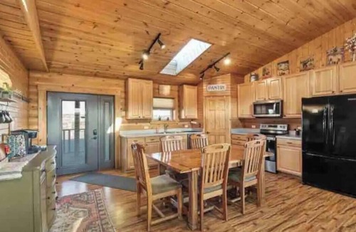 Yellowstone County Cabin | Spacious cabin with incredible views, wood fireplace, hot tub, and Wi-Fi!