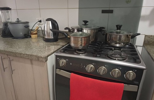Santa Beatriz Apartment | Spacious, close to parque de las aguas and national stadium, with garage.