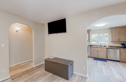 Coos Bay House | Spacious coastal property with separate living quarters, wood stove, & grill