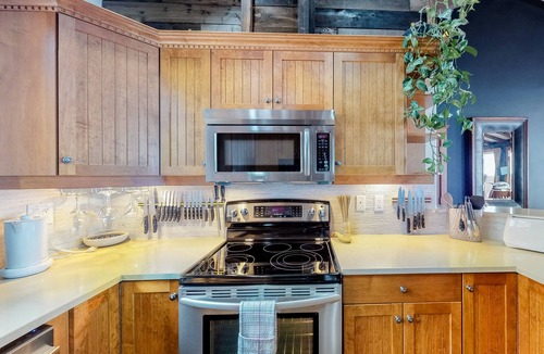 Big White Ski Resort House | Spacious condo with private hot tub, ski in/out access and mountain views