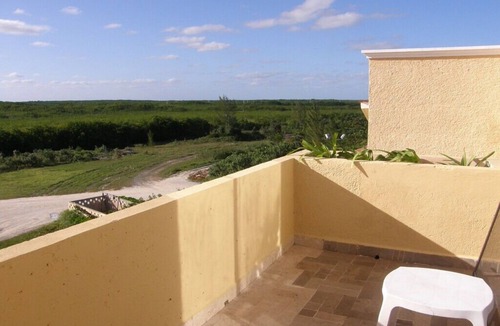Puerto Juarez Condo | Spacious condo across the road from the beach.