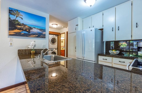 Kihei Condo | Spacious design with stunning wood floors
