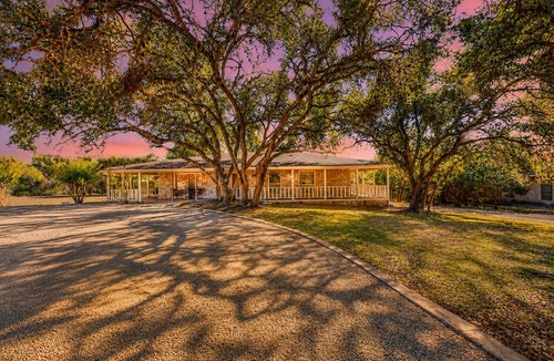 Wimberley House | Spacious dog-friendly home settled on a serene property with wrap-around porch