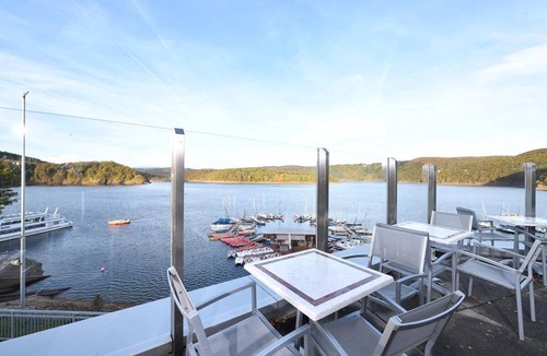 Heimbach Apartment | Spacious double suite with balcony and lake view