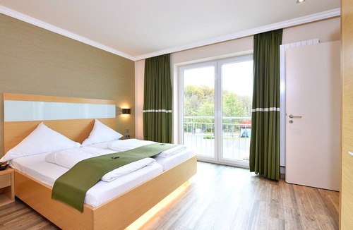 Heimbach Apartment | Spacious double suite with balcony and lake view