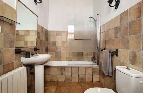 Canillas de Aceituno Villa | Spacious vacation home, adjacent to natural park, with shared pool.