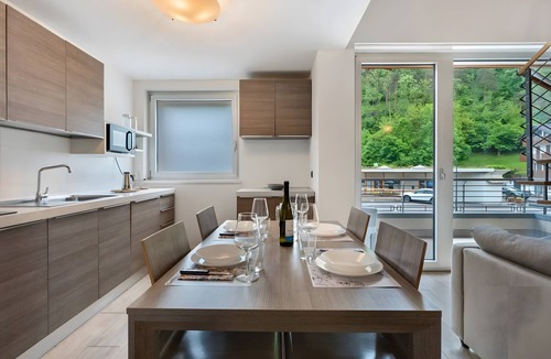 Ponte Arche Apartment | Spacious family loft near Comano Thermal Baths, ideal for 4–6 guests with balcony and garage