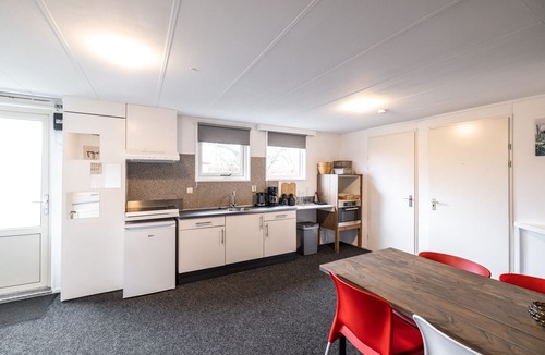 Linde House | Spacious holiday bungalow "Roy" in wooded and quiet area (12 p)