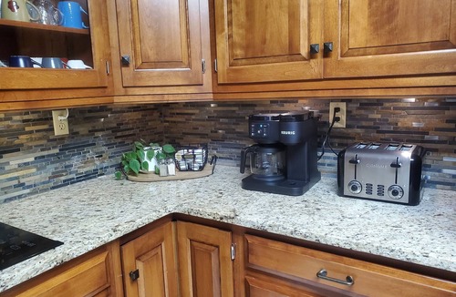 Killbuck House | Spacious home! Large deck, patio, waterfalls, koi pond, hot tub & massage chair!