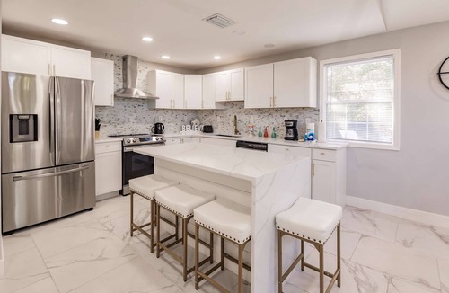 East Naples House | Spacious home private heated pool, fireplace, & two kitchens-near downtown