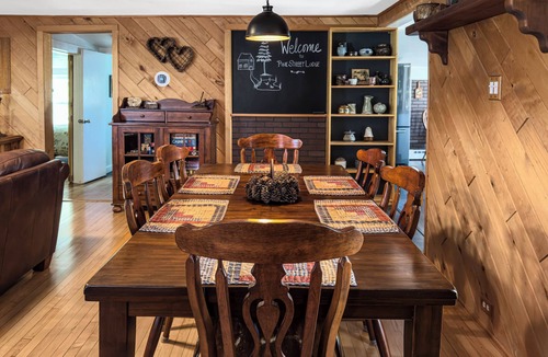 Calumet House | Spacious home with charming lodge feel – In town, one block from trails!