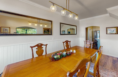 Gardiner House | Spacious home with river views, hot tub, covered porch, deck, grill, & W/D