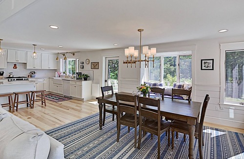 Newcastle House | Spacious lakefront home on lush 5-acre lot with sunny deck & private dock