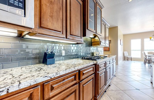 Lake Houston House | Spacious lakefront home with patio, grill, W/D, WiFi, & central AC