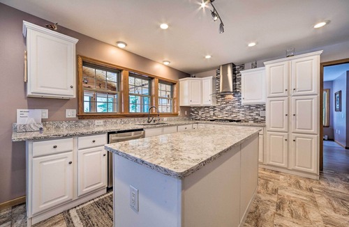 Rogers City House | Spacious Lakefront Home w/ Sunroom & Bar!