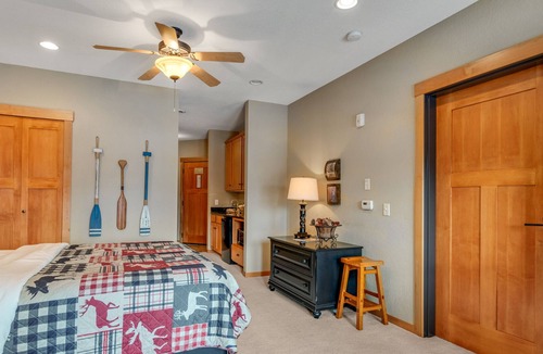 Three Lakes Condo | Spacious lakefront studio with kitchenette, balcony, pool, hot tubs, & firepit