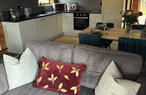 Pitlochry Cabin | Spacious Lodge with woodburner, hot tub and beautiful views from the patio deck.