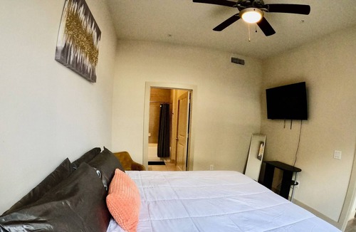 Riverside Terrace Apartment | Spacious Luxury for 6: WiFi, 3 TVs, Pool & Gym