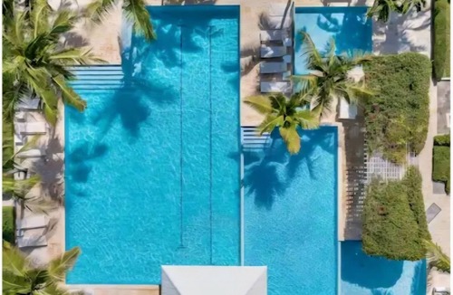 The Bight Apartment | Spacious luxury suite in exclusive gated community steps from Grace Bay Beach.