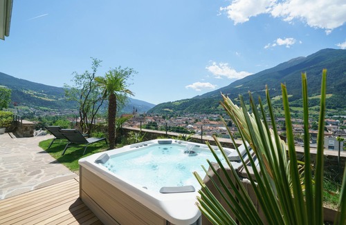 Bressanone Villa | Spacious mid-century style villa with views over Bressanone and private hot tub