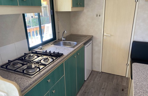 Viareggio Ski Chalet | Spacious mobile home, with veranda, on the family camping Paradiso