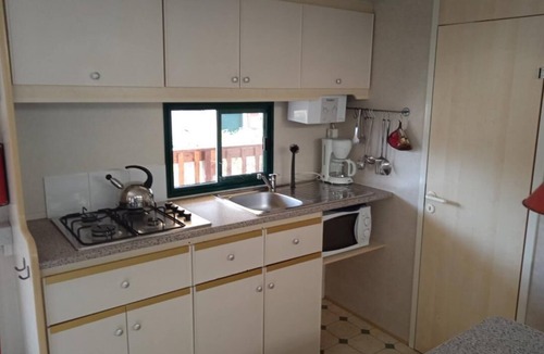 Viareggio House | Spacious mobile home, with veranda, on the family camping Paradiso