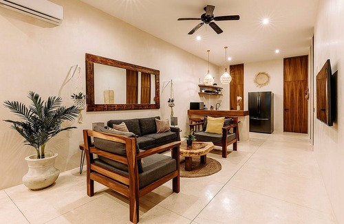 Zama Condo | Spacious modern 3-bedroom condo in Aldea Zama with premium finishes, a lush shared pool, and easy access to restaurants, shops, and Tulum’s beaches.