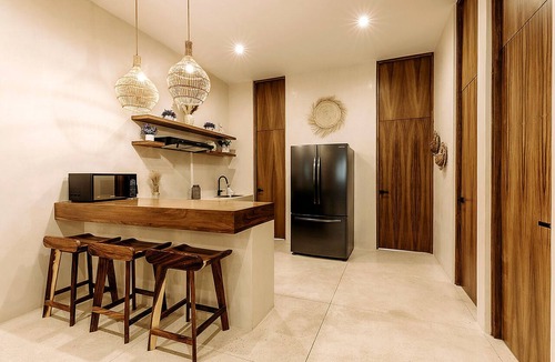Zama Condo | Spacious modern 3-bedroom condo in Aldea Zama with premium finishes, a lush shared pool, and easy access to restaurants, shops, and Tulum’s beaches.