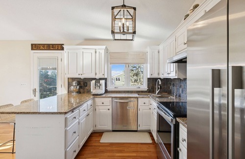 Plymouth House | Spacious, Modern 5-bedroom House with Hot Tub near Medicine Lake