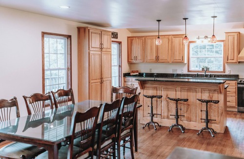 McArthur Cabin | Spacious modern cabin on 7.5 secluded acres, hot tub, Wi-Fi, Air Hockey, Trails.