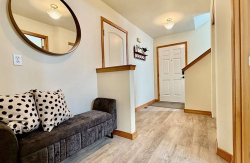 Olympia House | Spacious modern family home with open living, full kitchen, office nook, and private access