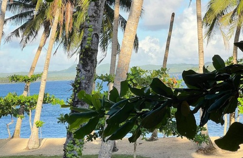 Catangnan Villa | Spacious native style house right on your own secluded beach.